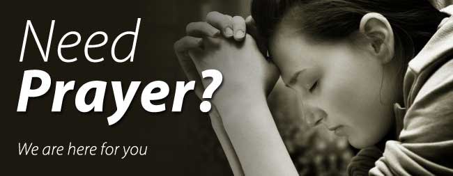 An image a person with their hands folded in prayer. Text appears staying, "Need prayer? We are here for you!"