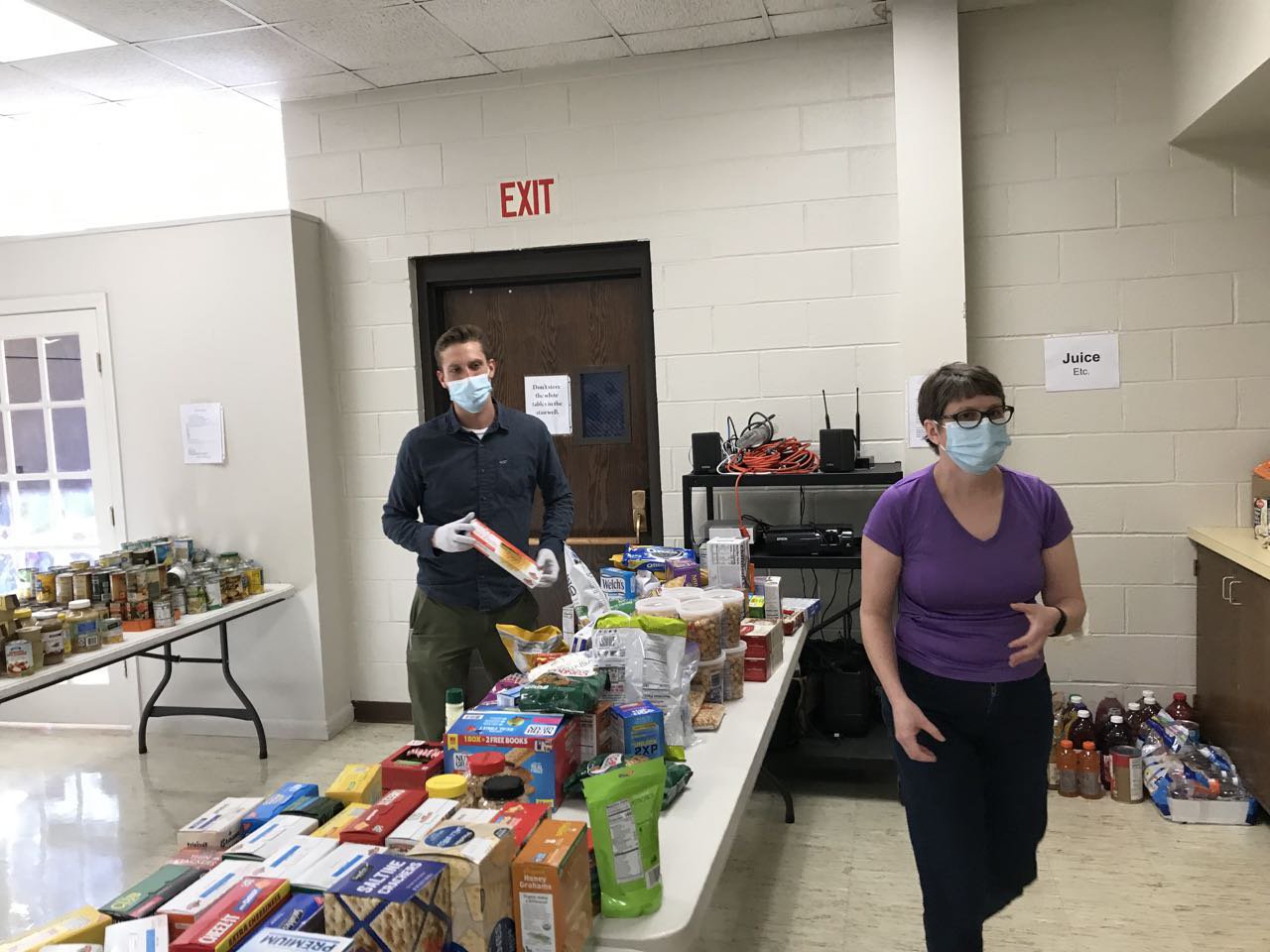 Food drive leader Richard Clarke and Debbie Loss.