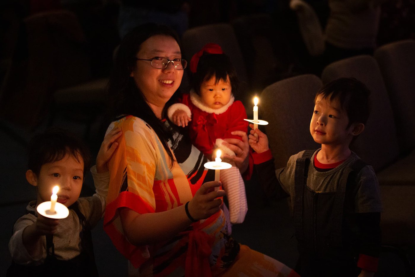 Family at Christmas Eve service in Mt Horeb, WI