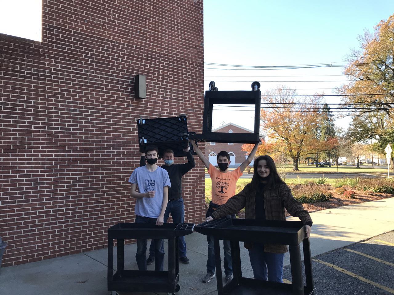 Some of our youth helping bring in food from cars: Luke Hodson, Damon Loss, Nathan Neidigh, and Amalia Hough.